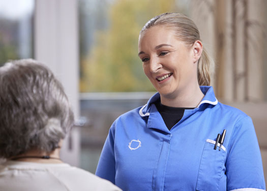 Female care worker with client